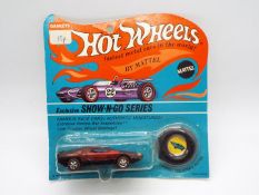 Hot Wheels - Redline - An unopened original carded Show-N-Go series Carabo in Magenta.