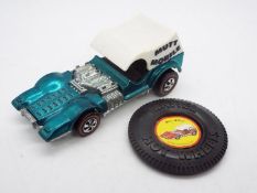 Hot Wheels - Redline - A 1972 Mutt Mobile in Aqua with an original plastic raised letter type