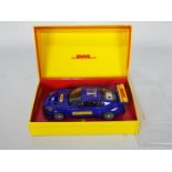 Superslot - A boxed Superslot H2946 Special Edition DHL 'Day Definite' Aston Martin.