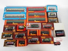 Airfix, Hornby, Lima - 23 boxed items of OO gauge freight and passenger rolling stock.