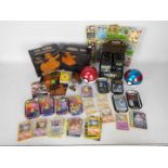 Pokemon - A quantity of Pokemon cards and collector tins.