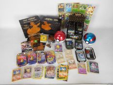 Pokemon - A quantity of Pokemon cards and collector tins.