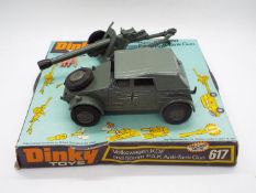 Dinky - A boxed # 617 Volkswagen KDF Car with 50mm P.A.K. Anti Tank Gun.