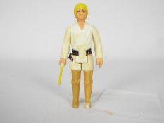 Star Wars - A loose vintage and ungraded Star Wars 3 3/4 action figure 'Luke Skywalker - Farm Boy'