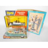 Dinky - 3 x Military models, a # 1040 motorised Navy Sea King Helicopter kit,