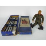 Palitoy - A vintage Blonde flock hair bearded Action Man figure with hard hands in military uniform.