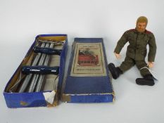 Palitoy - A vintage Blonde flock hair bearded Action Man figure with hard hands in military uniform.