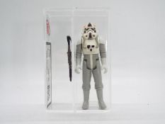 Star Wars - A loose vintage and graded Star Wars 3 3/4 action figure 'AT-AT Driver'.
