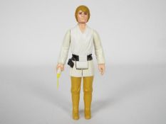 Star Wars - A loose vintage and ungraded Star Wars 3 3/4 action figure 'Luke Skywalker - Farm Boy'