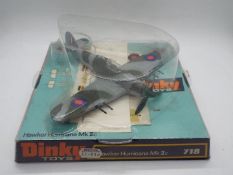 Dinky - A boxed # 718 Hawker Hurricane MkIIc in Green and Grey.