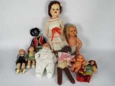 An assortment of dolls made from various