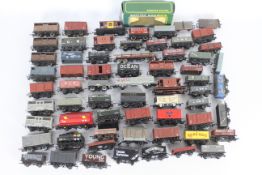 Hornby - Trix - Lima - Peco - A collection of 74 x unboxed 00 gauge wagons including Trix 7 plank