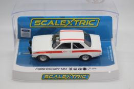 Scalextric - A boxed Scalextric C3934 Ford Escort MK.
