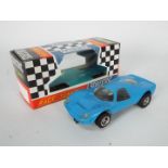 Scalextric - A vintage # C-15 Mirage Ford car in blue with a modern reproduction box.