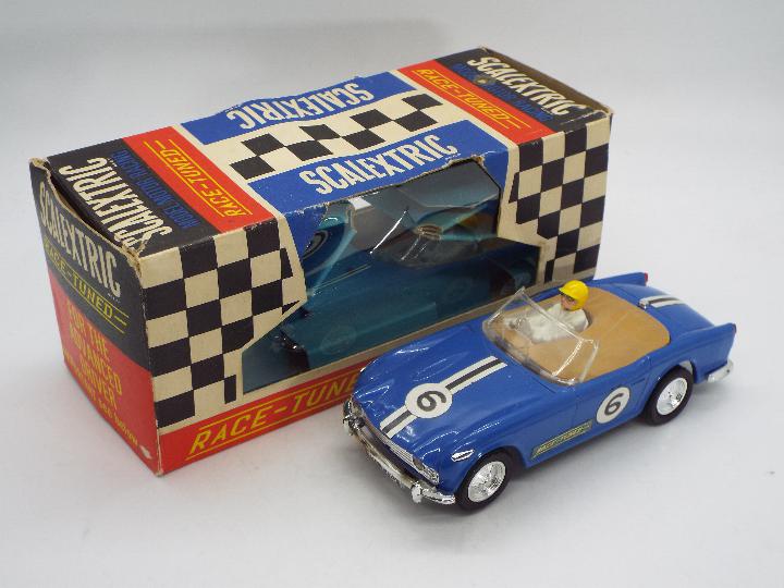 Scalextric - A boxed vintage Triumph TR4A Race Tuned model in blue # C-84.