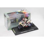 Scalextric - A boxed 2004 Moto GP Aprillia ridden by Jeremy McWilliams # C6011 The model appears