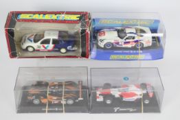 Scalextric - 4 boxed cars, # C2044 Ford Mondeo, # C2907 Dodge Viper, MG Lola and a Panasonic Toyota.