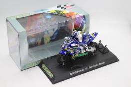 Scalextric - A boxed 2004 Moto GP Telefonica Honda ridden by Sete Gibernau # C6003 The model