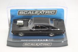 Scalextric - A boxed Scalextric C3936 Dodge Charger 1:32 scale slot car.