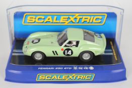 Scalextric - A boxed Scalextric C3061 Ferrari 250 GTO RN14 in Green 1:32 scale slot car from the