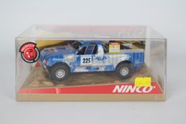 Ninco - A boxed Ford Ranger Pro Truck in Elf livery # 50329.