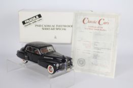 Danbury Mint - A boxed Danbury Mint 1:24 scale 1941 Cadillac Fleetwood Series 60 Special.