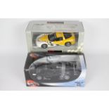 UT Models - Hot Wheels - 2 x boxed 1:18 scale cars,