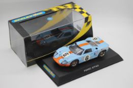 Scalextric - a boxed 1969 Ford GT40 number 6 car in Gulf colours # C2404.