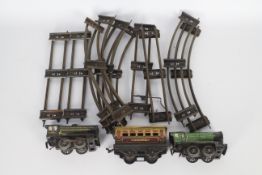 Hornby Dublo - Two unboxed O gauge Hornby Dublo clockwork locomotives (missing keys) with a Hornby