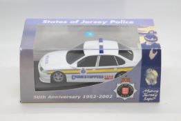 Scalextric - A boxed Scalextric Limited Edition Vauxhall Vectra 'States of Jersey Police'.