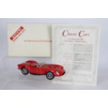 Danbury Mint - A boxed Danbury Mint 1:24 scale 1958 Ferrari Testa Rossa.