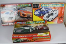 Scalextric - 3 x boxed sets of Micro Scalextric.