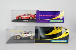 Scalextric - 2 x boxed Porsche 911 GT3R models, # C2664, # C2579.