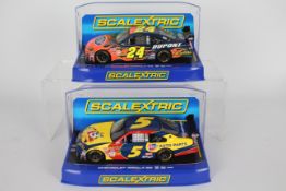 Scalextric - Two boxed Scalextric Chevrolet Impala SS Nascar 1:32 slot cars.