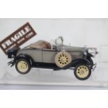 Danbury Mint - A boxed Danbury Mint 1:24 scale 1931 Ford Model A Roadster.