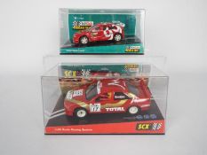 SCX - Scalextric - 2 x boxed cars, a Renault Megane Club 99 edition,