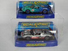 Scalextric - Two boxed Scalextric Ford GT-R 1:32 scale slot cars.
