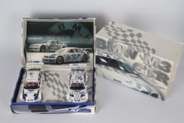 Fly - A boxed twin set of BMW M3 GTR models driven by Harry Stoeltie and Duncan Huisman.