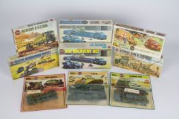 Airfix - Nine boxed and carded vintage plastic military model kits in OO scale by Airfix.