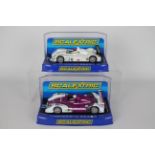 Scalextric - Two boxed Scalextric Porsche RS Spyder 1:32 scale slot cars.