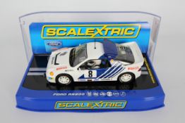 Scalextric - A boxed Ford RS200 number 8 car as driven by Kalle Grundel on the 1986 Rally Of Sweden.