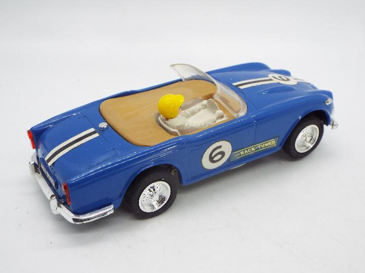 Scalextric - A boxed vintage Triumph TR4A Race Tuned model in blue # C-84. - Image 3 of 5