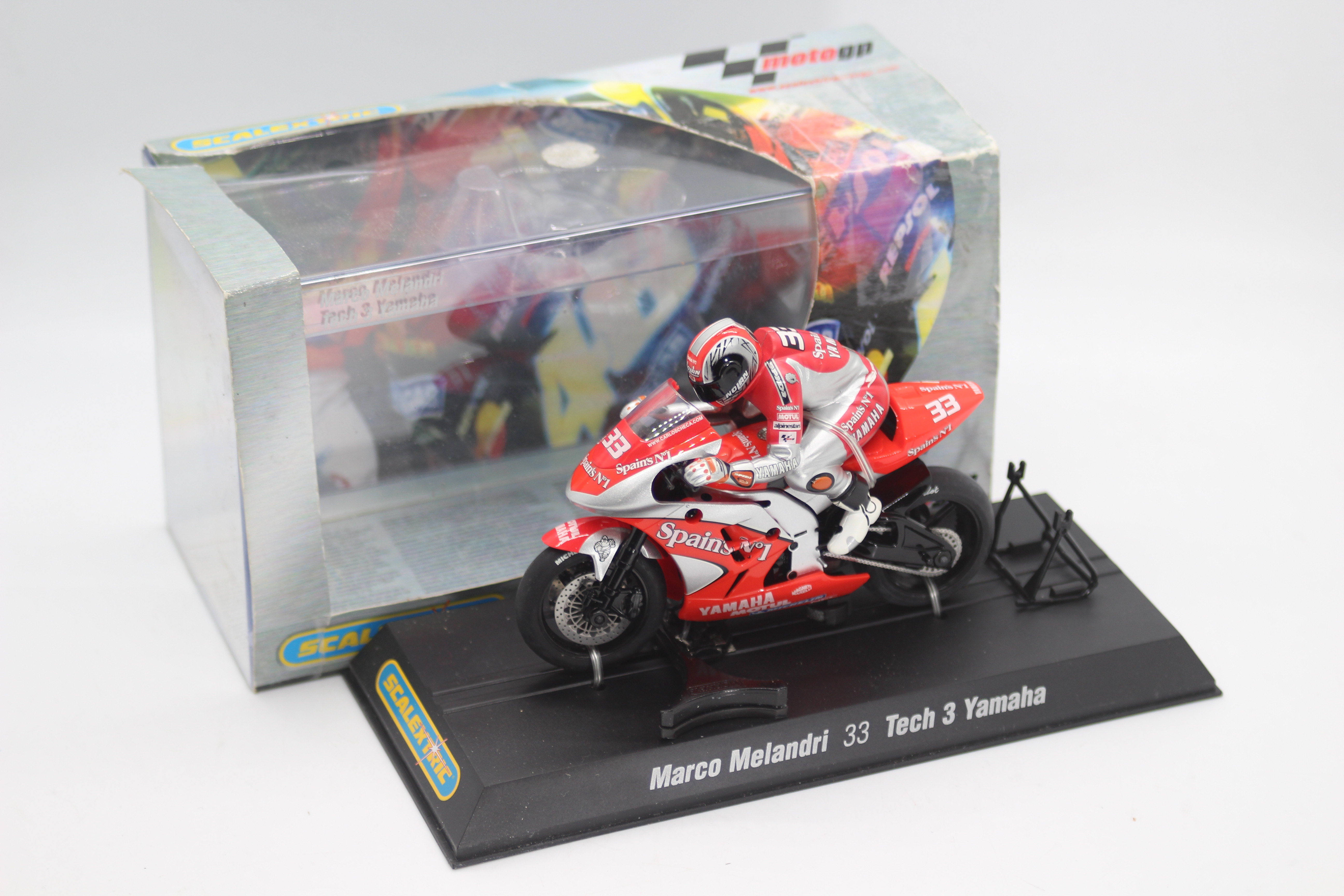 Scalextric - A boxed 2004 Moto GP Tech 3 Yamaha ridden by Marco Melandri # C6017 The model appears