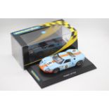 Scalextric - a boxed 1968 Ford GT40 number 9 car in Gulf colours # C2403.