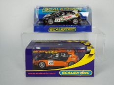 Scalextric - Two boxed Scalextric 1:32 scale Seat Leon slot cars.