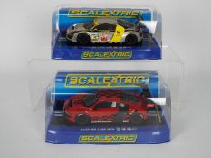 Scalextric - Two boxed Scalextric Audi R8 LMS GT3 1:32 scale slot cars.