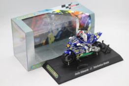 Scalextric - A boxed 2004 Moto GP Telefonica Honda ridden by Colin Edwards # C6007 The model