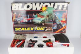 Scalextric - A boxed Blowout Racing set # C670.