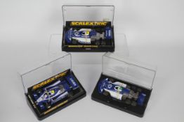Scalextric - 3 x boxed models, two March Ford six wheel cars # C129 and a Ligier JS11 # C137.