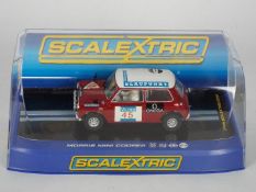 Scalextric - A boxed Scalextric C3100 Morris Mini Cooper '1000 Lakes'.